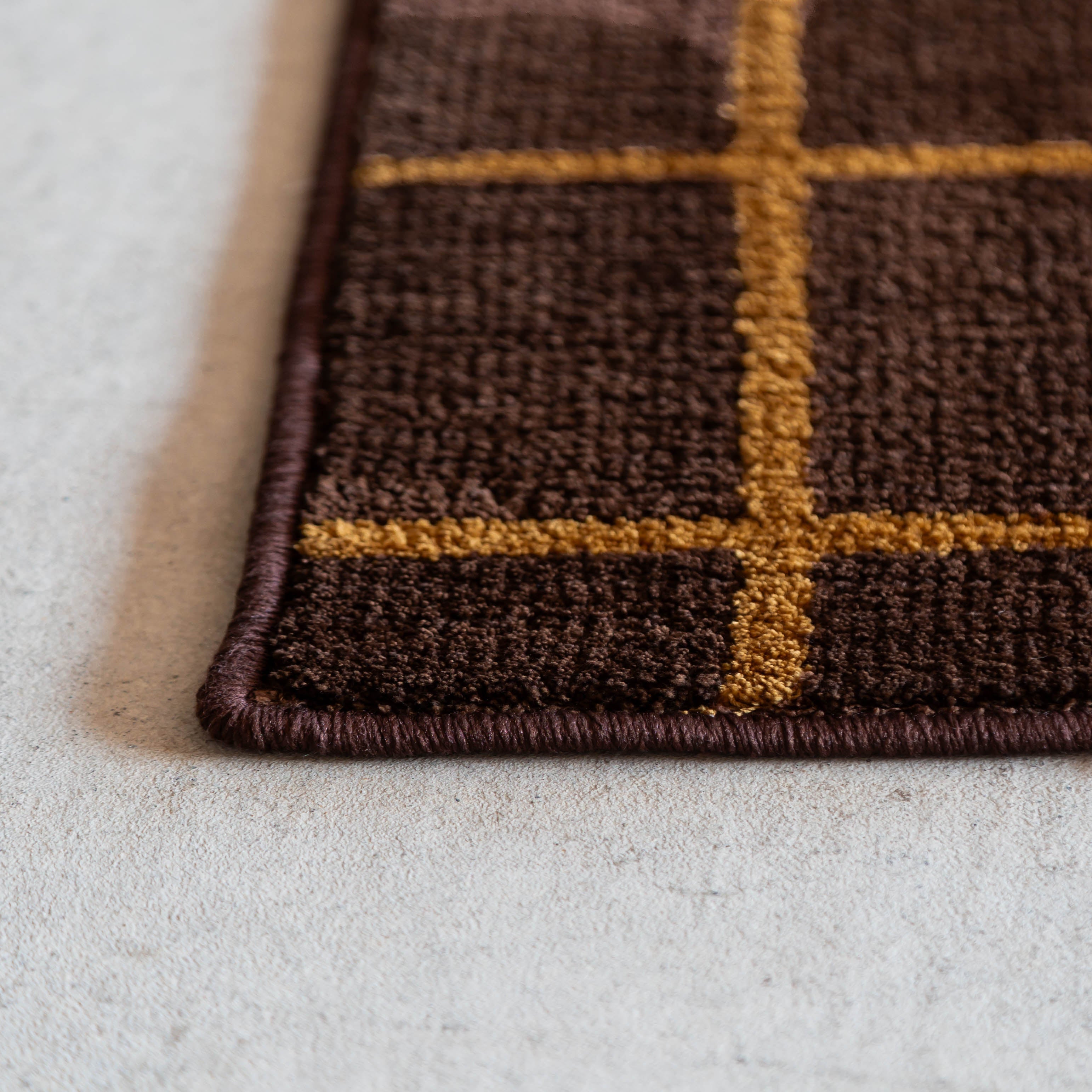 シンプルなグラフチェックのラグ ブラウン